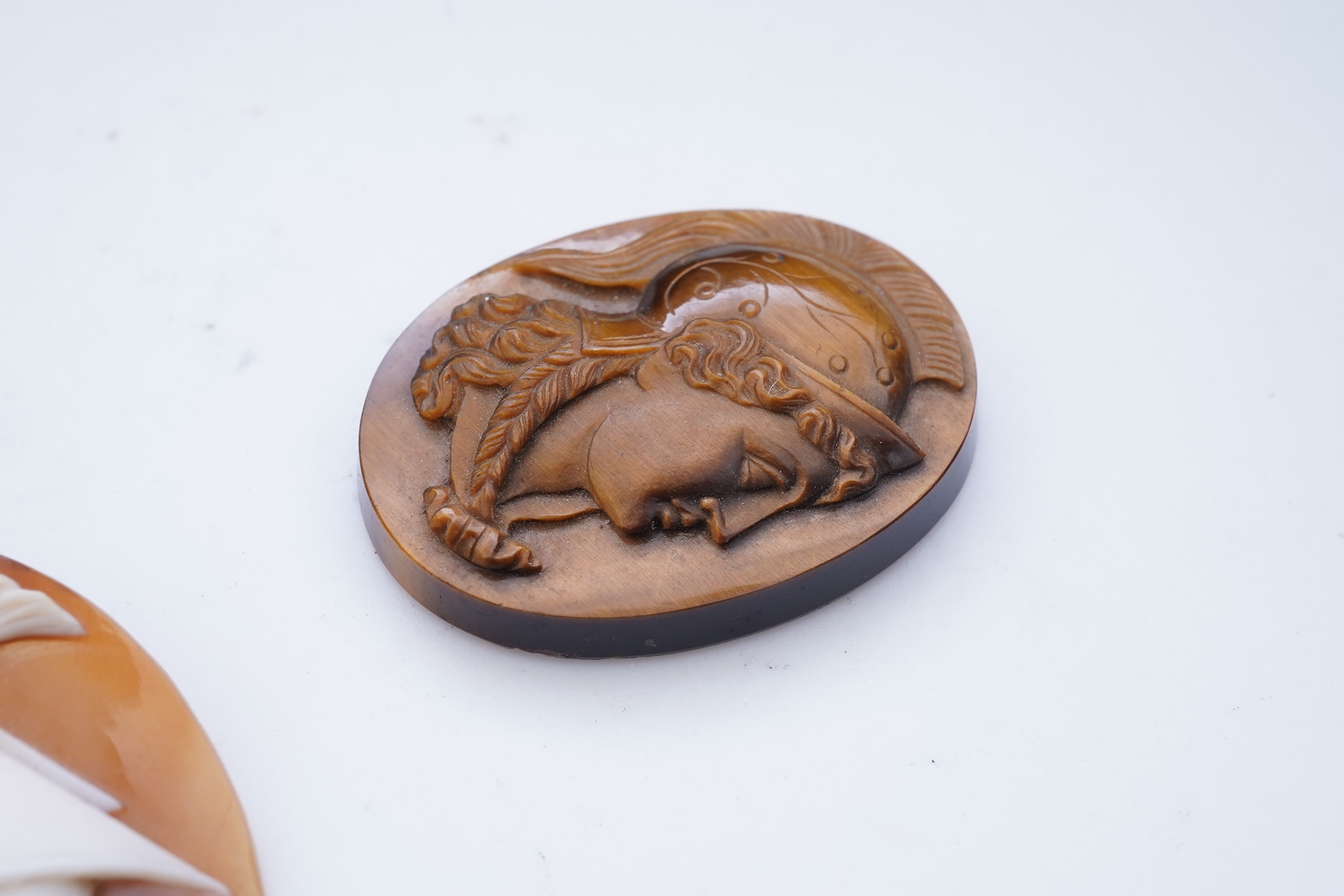 Two cameos and a stick pin, 19th century